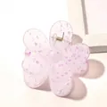 Detail of light purple flower-shaped hair claw clip with unique purple speckled pattern - Leopard Spot Flower Hair Clip - Purple