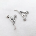 Detailed view of vintage silver cheerleader charms for DIY jewelry and bracelets - 1Pc Cheerleader Girl 16x24mm