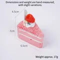 Pink triangular mousse cake squishy toy with cream and raspberry topping, 7cm size - Pink