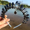 Black crystal crown headband with silver sun charm and teardrop pendant detail - Black/Sun/Black Pendant