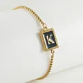 Titanium steel box chain bracelet featuring a black enamel letter K pendant in 18K gold finish - Letter K (ZH497G-K-02)