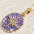 Goldene ovale Muschelkette mit violettem Sternanhänger und glänzenden Zirkoniasteinen - Lila