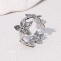 Minimalist stainless steel flower ring with open adjustable band and silver finish - Steel
