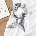 Blue and white silk scarf with abstract fish print tied in a bow on satin fabric - Letter Z - Blue Grey Abstract Architecture Fish