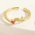 Macro view of gold-plated crown ring featuring a red heart zircon and accent crystals - Adjustable Open / Rose Red Water Drop Zirconia