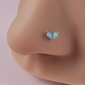 Close-up of silver nose stud with two blue teardrop gemstones on model nose - Blue Double Water Drops