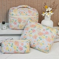 Three-piece light blue floral quilted cotton makeup bags with a floral pattern - Oil Paint Large Flower