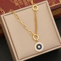 Collier oeil bleu doré avec cristaux scintillants sur un coffret à bijoux - Collier Mauvais Œil Doré (1#)