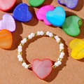 Handmade beaded ring featuring red shell heart bead and white golden accents - White Gold Bead Heart Ring (FG-R24011213A)