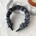 Dark grey pleated velvet headband with soft texture on a clean minimalist display - Gray