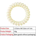 Detail of white spiral telephone cord hair tie with dimensions 5.5x5.5x1cm and 5.6g weight - 2# Light Yellow Transparent Spiral Hair Tie