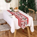 Christmas table runner with red festive wreath and tassels on a cozy holiday tabletop - Style D (180x33cm)