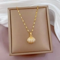 Elegant gold-plated seashell pendant necklace with sparkling white zircons on a leather box - Titanium Steel + Pearl + Zircon / Gold