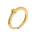 Macro shot of 18K gold plated cross ring with pavé cubic zirconia and adjustable band - Sagittarius / Gold