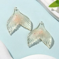 Detail of glittery resin mermaid tail pendants for DIY necklaces and crafts - 2.8x3.1cm / Light Yellow