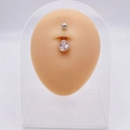 Silver stainless steel belly button ring with crystal flower design on silicone model - Abstract Entwined Flower