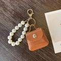Brown crocodile leather mini bag keychain with pearls and gold hardware accessory - Brown