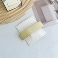 Elegant gold geometric spring hair clip with vertical stripes on display card - Square Gold
