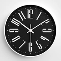 Modern 12-inch round wall clock featuring a black spiral dial and white artistic numbers - Black Dial White Frame