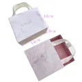 Elegant marble purple jewelry gift box with white ribbon handle and The Best text - Purple Marble Paper Box