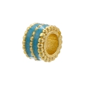 Macro detail of 18K gold plated bead with blue enamel and textured metal dots - Gold Blue Enamel