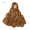 Detail of tan cotton jersey hijab showing soft draping texture and fine hemmed edges - Brownish Tan (#35)