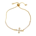 Elegant gold cross bracelet with shimmering zircon stones and adjustable slide clasp - White