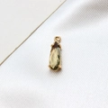 Macro shot of champagne waterdrop crystal pendant with gold claw setting for DIY jewelry - Olive Green
