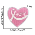 Macro shot of Hope pink heart embroidery patch with ribbon and detailed stitch texture - Pink Ribbon Patch Style 11 (HOPE)