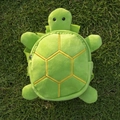 Green plush turtle-shaped backpack for small dogs with shell texture on green grass - Turtle / Green