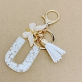 Letter U keychain with white shell stone resin, butterfly charm and white tassel - Letter U