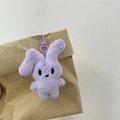Cute purple plush rabbit keychain accessory featuring a matching hook and soft fur texture - Keychain / Purple