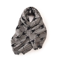 Fashionable black and brown houndstooth scarf with tassels on a clean white background - Houndstooth / Black