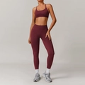 Seamless burgundy yoga set featuring a strappy sports bra and high waisted leggings - S / Sports Bra + Leggings / Cherry Red