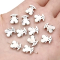 Silver bear alloy pendants for DIY jewelry making shown in hand for size reference - Bear / 9x11mm