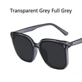Modern square sunglasses with transparent grey frame and grey lenses for a minimalist look - Transparent Grey / Grey Lens