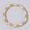 Pink beads and gold metal accents handcrafted beaded ring for an elegant daily look - Light Pink and Gold