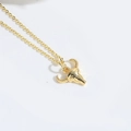 Vintage golden bull head pendant necklace with minimalist metallic finish on white background - Bull Head (XL3322-5)