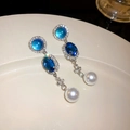 Blue gemstone and pearl drop earrings with sparkling rhinestones in a silver-tone finish - 11# Silver Earring Post-Blue-Oval