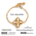 Close-up of adjustable stainless steel flower ring with clover-shaped clear zircons - Four-Leaf Clover (JDR0312204) / Adjustable / Gold
