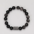 Detail of obsidian beaded bracelet with silver metal spacers and rectangular charm - Dragon Pattern Silver Obsidian (D7013)