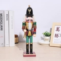 Close-up of traditional wooden Nutcracker soldier figure with golden trumpet decor - 30CM Trumpeter Style