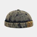 Detail of vintage acid wash denim docker hat with textured yellow fringe patch accent - Yellow Blue