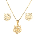 Macro shot of gold hollow tiger head jewelry set including necklace and stud earrings - Gold