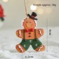 Gingerbread man ornament with green overalls and black hat for Christmas tree decor - Style D