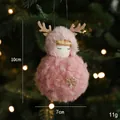 Pink plush Christmas angel doll with reindeer antlers hanging on a lit Xmas tree - Plush Girl Pendant Style A