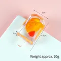 Orange resin popsicle pendant with red heart, dimensions 6.5x3x2cm, weight approx 20g - Walnut