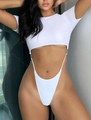 Detailed view of white cut-out one-piece bikini with metal rings and high-leg design - S / White