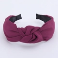 Detail of burgundy wide twisted headband with high-quality plain fabric texture for women - Dark Purple