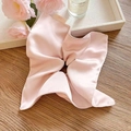 Pink satin scrunchie with large bow design on elegant tray with rose and perfume - Pink